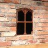 Eisenfenster aus Gusseisen, Stallfenster -Gretje- klappbar in Mauer eingebaut